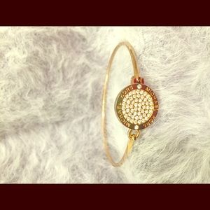 Michael Kors gold tone disc bangle bracelet